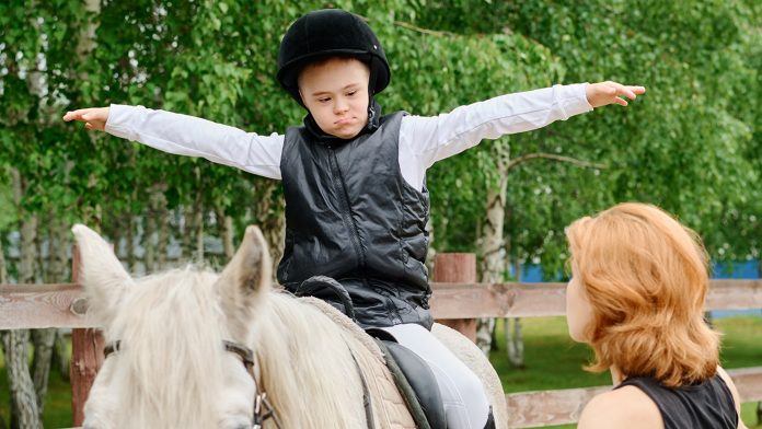 Riding Horse with Equestrian Instructor in Forest Setting